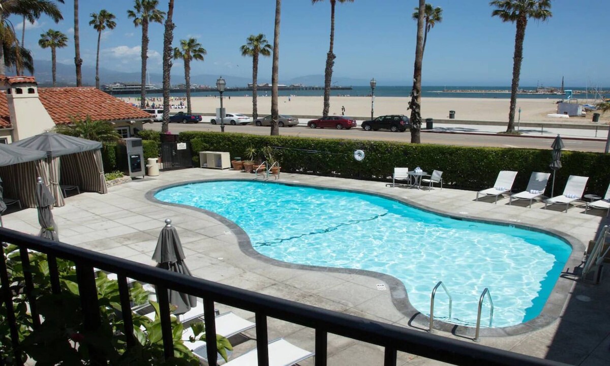 West Beach Hotel | Charming Beachfront Stay! Pool & Outdoor Activities! Waterfront Trails Nearby!