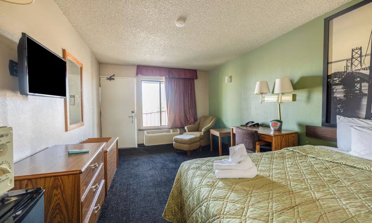 Barstow Hotel | Deluxe King Bed Comfy Room Surrounded by Route 66 History in Barstow