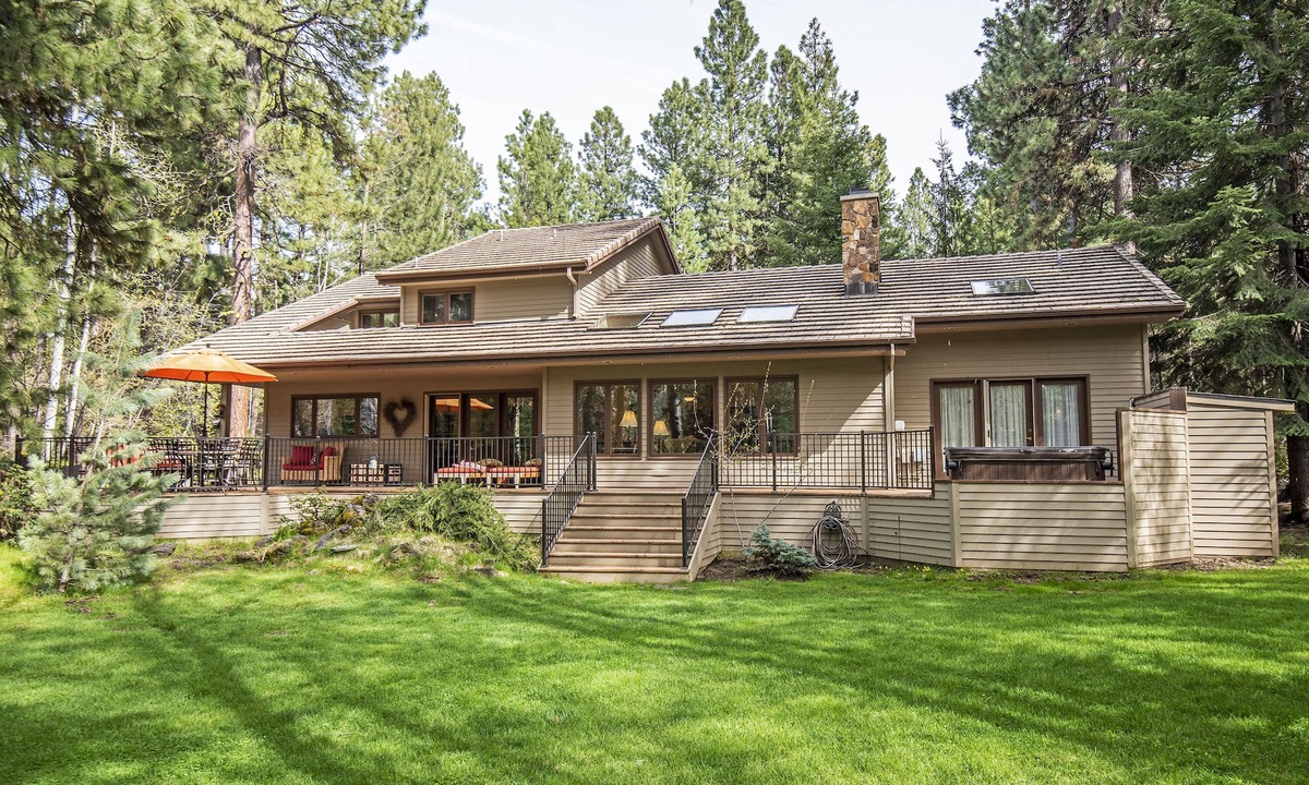 Black Butte Ranch House | GH219 | Luxury home with a private hot tub and large deck and grassy yard.