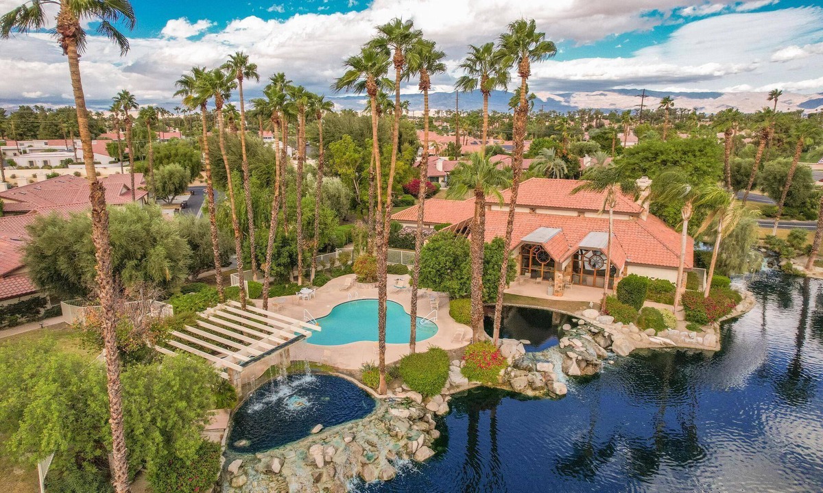 Palm Desert Condo | Lake view, steps to the pool, resort in Palm Desert.