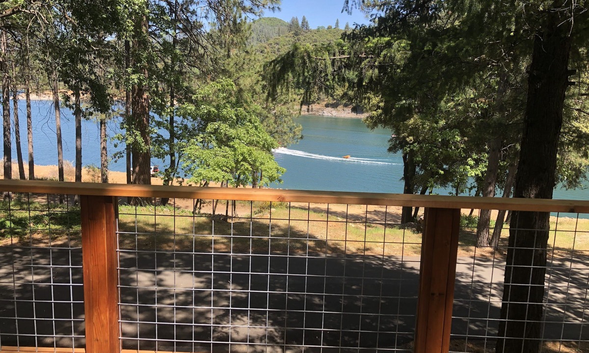 Lakehead House | Lakefront house with 1000 sq/ft of decking with unobstructed view of the water.