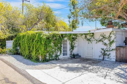 Santa Barbara House | Vine-Covered Garden Suite | Queen + Patio