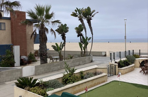 Hermosa Beach House | 2 Bedroom Strand Townhome with A/C, Rooftop Deck and Parking. Walk to Beach Life