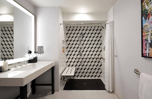 Norma Triangle Hotel | 3 Suites w/Access to Rooftop Lounge, Tennis Court, Pool & Local Hotspots