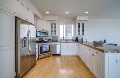 The Strand House | Beach Townhome with Ocean Views, Sleeps 6, Garage Parking Space