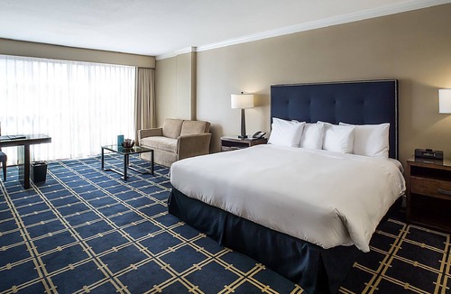 Sunnyvale West Hotel | Deluxe 1 King at The Grand Hotel, Onsite Pool, Pet-Friendly Property