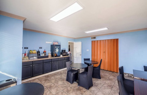 Barstow Hotel | Deluxe King Bed Comfy Room Surrounded by Route 66 History in Barstow