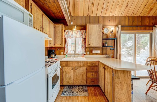 Sierra Tract House | Dog-friendly 2-story cabin with loft, fireplace, board games, & wooded views