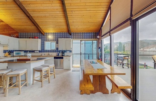 Orondo House | Dog-friendly waterfront home with pool, tennis courts, & large lawn