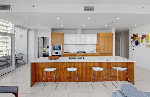 Downtown Los Angeles Apartment | Enjoy city views from our three bedroom suite, private balcony & 2 deluxe baths