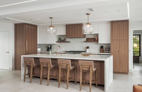 Corona del Mar Condo | Experience a luxurious 4-bedroom, 4.5-bath mid-century modern coastal escape in Corona Del Mar, CA. Steps from the Pacific Ocean, this fully remodeled home features a gourmet kitchen, private hot tub, sauna, and Cntrl4 system. Comfortably fits 10