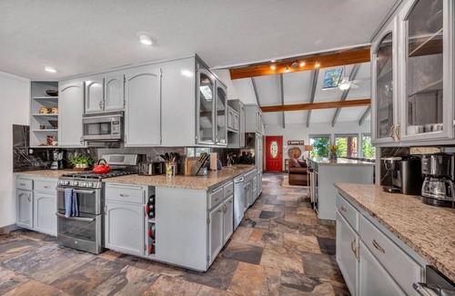 Lake Forest House | Experience luxury at The Bear Den in Tahoe City, a spacious 4-bedroom retreat with hot tub