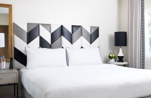 Norma Triangle Hotel | Explore Luxurious Suite with Living Spaces, Private Balconies, Rooftop Pool