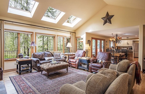 Black Butte Ranch House | GH219 | Luxury home with a private hot tub and large deck and grassy yard.