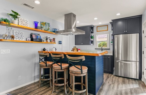Ventura House | Gorgeous Midtown Gem with Sunroom and Guest Cottage. Half Mile to the Beach.