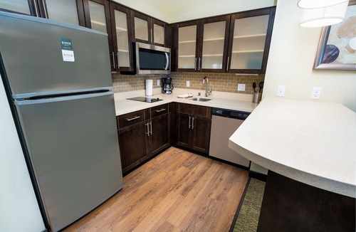 Newark Condo | King Suite. Free Breakfast. Pool. Shared BBQ. Great for Business Travelers!