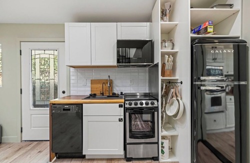 Marina Peninsula House | Luxury Beach Retreat Ocean Views Tesla charger. Sleeps 10