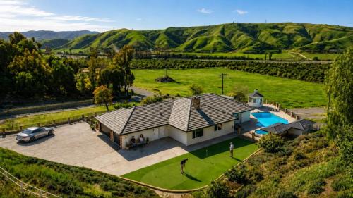 Redlands Villa | Luxury Redlands Escape-Pool Putting Green Arcade
