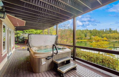 Rollingbay House | Luxury waterfront home with hot tub, dock, game room, and stunning views