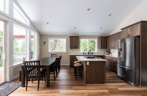 May Creek House | May Creek Peaks: Custom built home on private acres w/mountain views, covered spa, luxury amenities