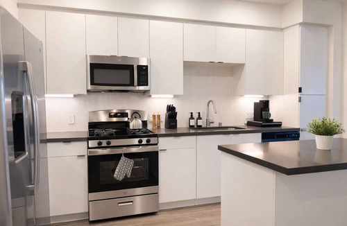 Lyon Street Apartment | Modern Apartment Near Disneyland | Pool & Gym