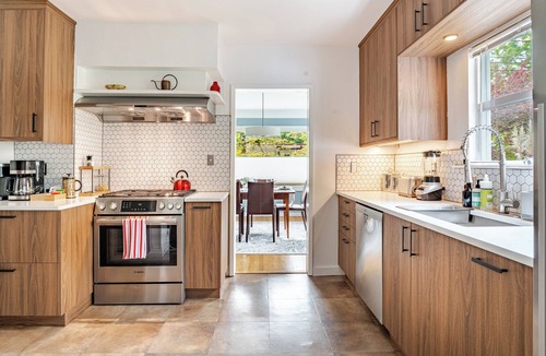 Phinney Ridge House | Patio with BBQ+fire pit, Rec room with TV+Foosball