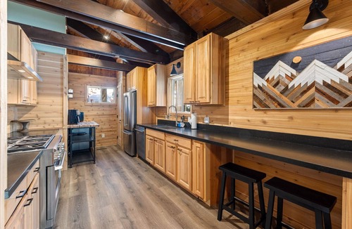 McKinney Estates House | Remodeled West Shore Cabin/1 mile to Chambers Landing Beach/Near Homewood Ski