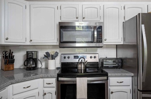 Mount Hood Village House | Riverside Retreat with Hot Tub & Deck | Peaceful Escape on the Sandy River in the Pines