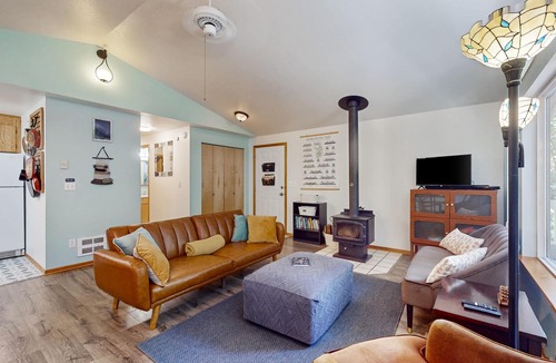 Burley House | Serene family getaway with shared pool and hot tub, deck and gas grill