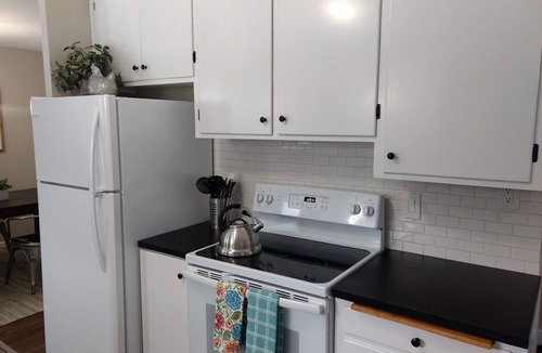 Moran Prairie House | South Hill's The Blue Bungalow l Mid-Century l Private Yard l EV Charger