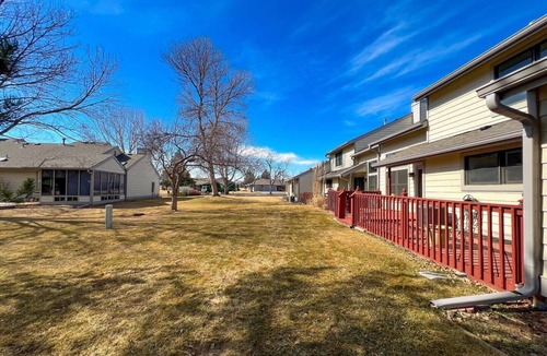 Fort Collins House | Stunning 5BR Golf Course Townhome Arcade Lounge