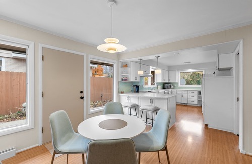 Moran Prairie House | Stylish South Hill Getaway | Bar & Game Room