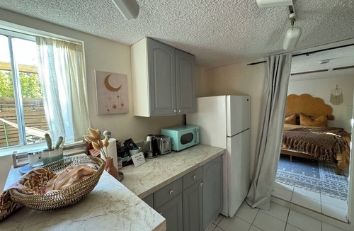 Live Oak Apartment | Sunny boho retreat with deck & stylish hot tub