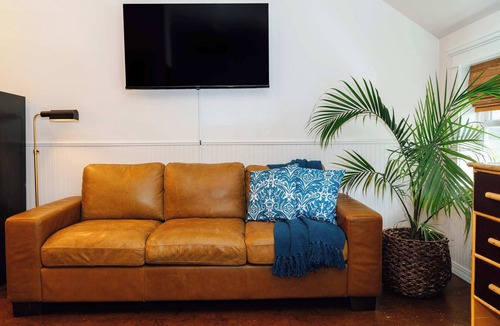 Historic Railroad District Apartment | Swank Suites- Top Floor + Private Patio