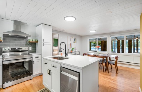 Fall City Cabin | Two lakefront cabins with two docks, kayaks, 100' of waterfront, deck, & firepit