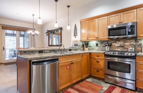 Woodwinds House | Upscale 4 Bed, 3 Bath at the Woodwinds with Mountain Views, Private Hot Tub, and Garage sleeps 10