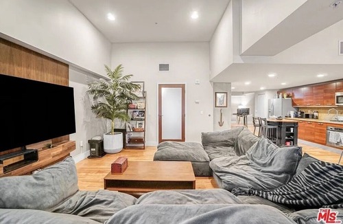 Historic Core Condo | Urban Chic 1-bedroom Loft w Cathedral Ceilings + Skylight in Vibrant Los Angeles