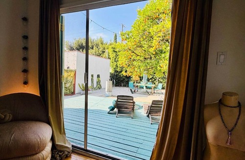 Palms House | West LA Bungalow with Lush Garden by Colby and Conrad