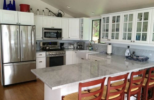 Roche Harbor House | Westcott Bay Beachfront Home - Hot Tub with a view of the Bay