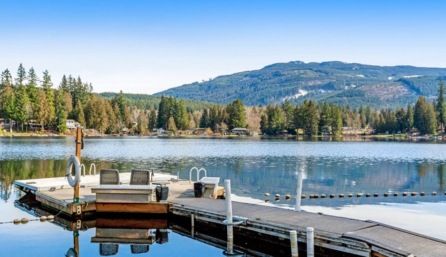 Custom lakefront gem with private dock, hot tub, firepit, & chef's kitchen