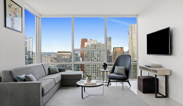 Enjoy corner city views with two king beds and two bathrooms.