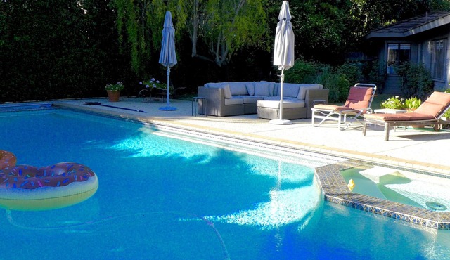 Great location with pool, hot tub and huge yard
