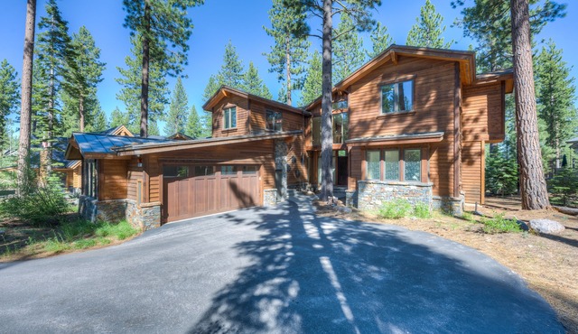 Inviting home with golf course views, large deck, & modern interior