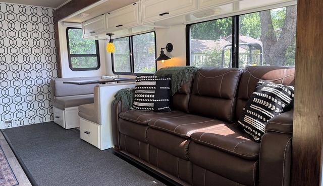 Modern RV on a serene, adventure filled property with AC, WiFi