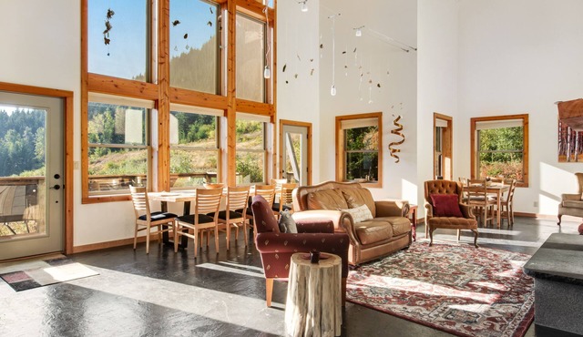 Ski-in/ski-out home with mountain-view balcony, multiple living areas, & W/D