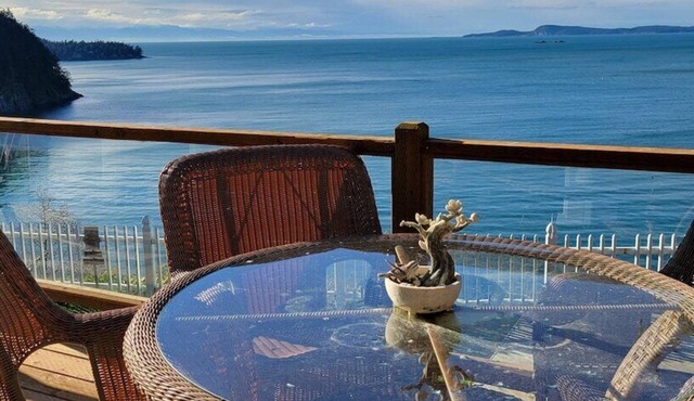 Sunny House Cliff Side Views