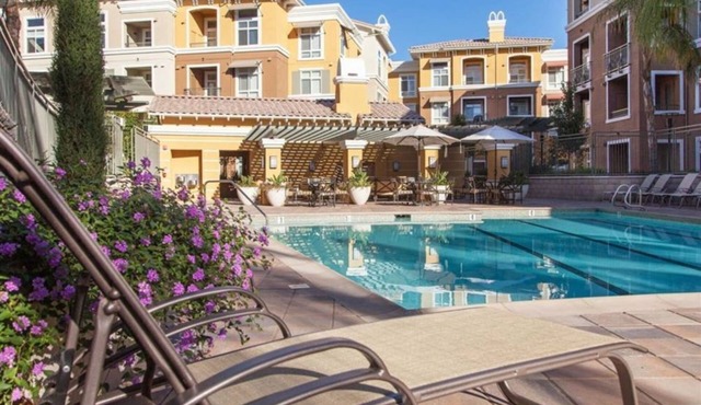 Verdant 2BR Escape with Pool & Lounge