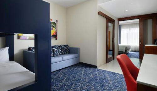 One-Bedroom King Suite with Bunk Beds and Sofa Bed