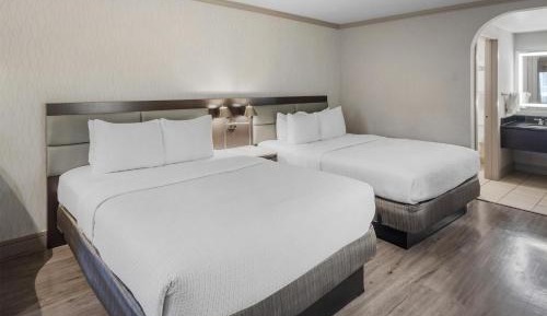 Queen Room with Two Queen Beds and Single Sofa Bed